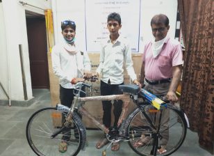 work charitable trust giving cycle to boy